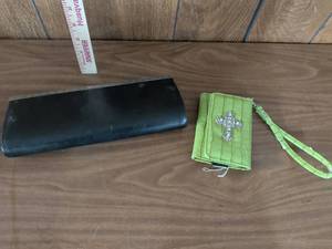 lot 98 image: Lot of 2 Handbags Black Clutch and Green Textured Wristlet Wallet with Cross