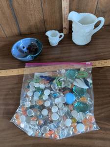 lot 115 image: Lot of 2 Opaque White Glass Pitchers, Blue Glazed Bowl and Bag of Glass Gems