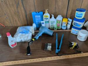 lot 161 image: Assorted Personal Care Lot Petroleum Jelly, Lotions, Sunscreen, Hair Dryer, Flat Iron