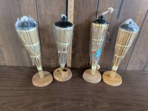 lot 185 image: Bamboo Torch Lot of 4 with Round Base