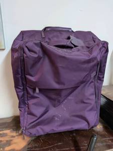 lot 237 image: Purple Wheeled Bag with Top and Side Carry Handles