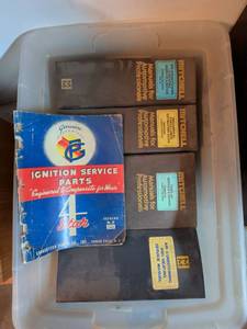 lot 240 image: Mitchell Automotive Manuals Lot of 4 Binders with 1944 Ignition Parts Catalog