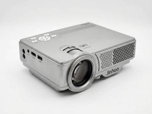 lot 448 image: Jinhoo 1080P Mini Projector w AV Cable & 100in 169 Projection Screen