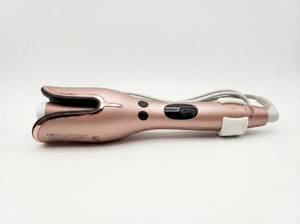 lot 464 image: CHI Spin N Curl 1in Ceramic Rotating Curler Rose Gold Tone