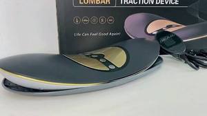 lot 512 image: Lumbar Traction Device with Heat and EMS Icons, Oval Gray and Gold Design