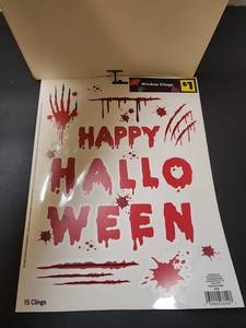 lot 22 image: Assortment of Halloween Trick-or-Treat Bundle Window Clings  - Retail $15