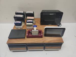 lot 28 image: Office Equipment Lot Sony Dream Machine Clock Radio, Stamps, La Crosse Display, Desk Organizer