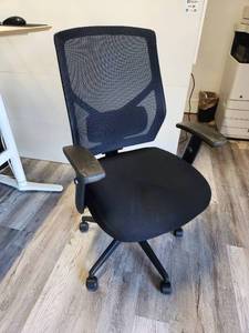 lot 64 image: Black Mesh Office Chair with Padded Seat and Armrests