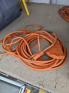 lot 6021 image: Orange Extension Cord with Triple Outlet Tap End