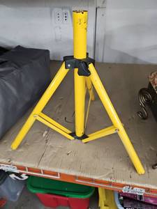 lot 6023 image: Yellow Steel Tripod Stand with Folding Legs and Black Clamp Collar