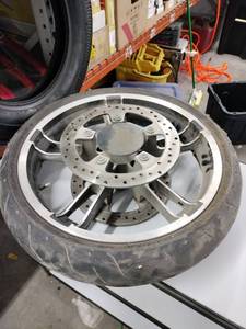 lot 6059 image: Harley-Davidson Front Motorcycle Wheel w Dunlop D408F Tire & Brake Rotors