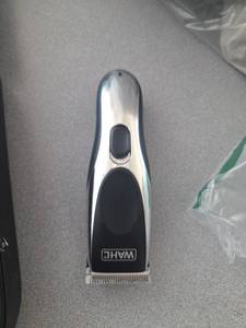 lot 316 image: Wahl Hair Clipper with Guide Combs and Storage Case Aplears Pre Owned  - Retail $0