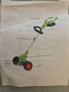 lot 372 image: Grass Trimmer Edger with Lithium Battery, Wheels and Blade - Retail $0