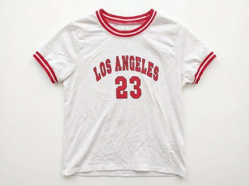 lot 685 image: SHEIN Kids Los Angeles 23 Short Sleeve Ringer T-Shirt WhiteRed Size 7Y