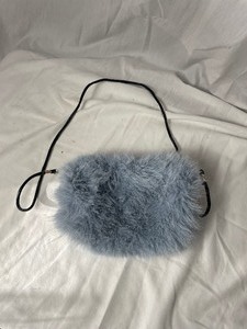 lot 36782 image: gently used light blue faux fur sm all purse with outer pockets to keep hands warm