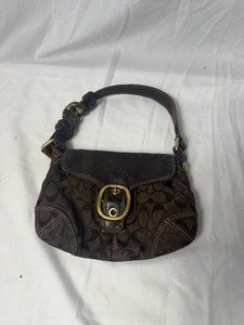 lot 36794 image: gently used small dark brown coach hand bag