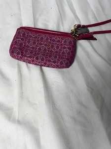 lot 36796 image: gently used small wrist coach carrying bag