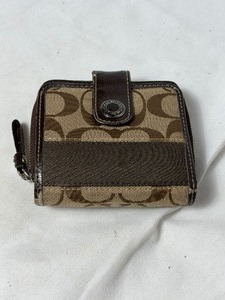 lot 36797 image: gently used small drk brownlt brown coach wallet