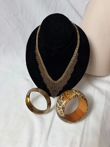 lot 36838 image: Tiffany & Co. Elsa Peretti Mesh Necklace, Leapord Print & Metal Bronze Braclets.