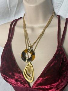 lot 36843 image: Golden Tone New York KC & Round Pendant Necklace.