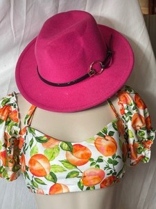 lot 36913 image: Pink Wool Felt Fedora Hat With Black Belt Style Around The Brim.