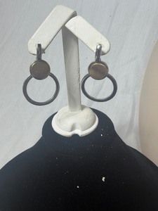 lot 36877 image: Pair of Silver toned dropped earrings Featuring a Circular Ring Inside