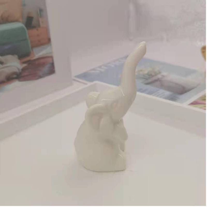 lot 72053 image: White Elephant Statue and Figurines Home Decor, Christmas White Elephant Gifts, Small Shelf Decor Accents, Modern Mini Knick Knacks for Living Room, Ceramic Decorative Objects for Shelves - Retail $8