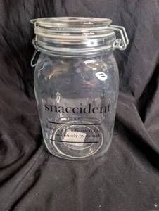 lot 1507 image: Clear Clip-Top Jar with Wire Bail Lid, Snaccident Quote