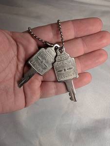 lot 2108 image: Amelia Earhart 2500 Key Pair on Ball Chain