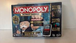 lot 12 image: Hasbro Monopoly Ultimate Banking Board Game Ages 8