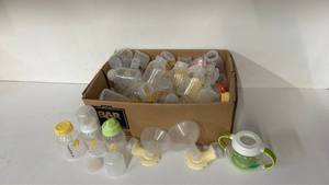 lot 135 image: Medela Breast Pump Parts and Bottles Mixed Lot with Lansinoh miOmmo Cup