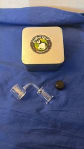 lot 141 image: Puffing Bird Concentrating Clear Glass Angled Banger with Case and Black Container