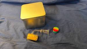 lot 143 image: Clear Glass Angled Banger Nail with Silicone Container and Metal Tin