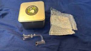 lot 144 image: Puffing Bird Concentrating Clear Glass Angled Banger with Tin Case