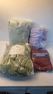 lot 196 image: Private Quarters Bamboo Throw, Diamond Trim Sarong, Alexander Julian Pillowcases Lot