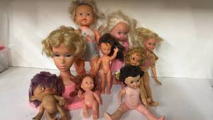 lot 221 image: Lot of 9 Assorted Dolls Including Styling Head and Purple-Haired Figure