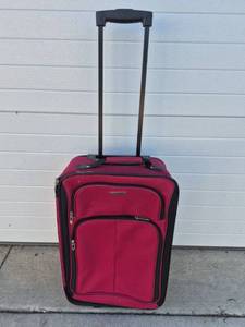 lot 49 image: Red Wheeled Carry-On Luggage with Retractable Handle and Additional Bag
