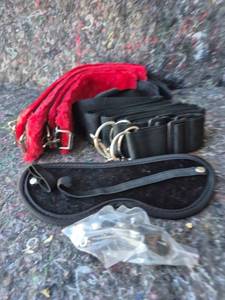 lot 51 image: Dog Collar and Leash Set with Red Fleece Lining Black Nylon...Thats What AI Said They Are But I Believe They Are Supposed to be Worn by Adults...