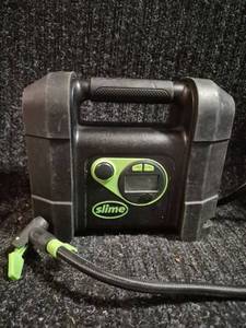 lot 111 image: Slime 2500 mAh 11.1V Portable Air Compressor Tire Inflator