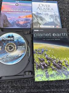lot 123 image: DVD and Blu-ray Lot The National Parks, Over Alaska, Planet Earth, Poseidon