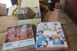 lot 5586 image: Puzzles and DVDs
