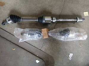lot 11264 image: Front Drive Axle CV Half Shaft Assembly with Intermediate Bearing Support