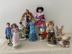 lot 3 image: Lot of 9 Assorted Figurines, Including 1984 Olympic Soccer Eagle, Lefton, Avon doll and more