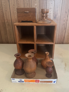 lot 14 image: Wooden cubby 12 by 12 and 7 turned wood candlesticksvases