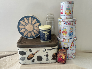 lot 27 image: Metal bread box and vintage tins