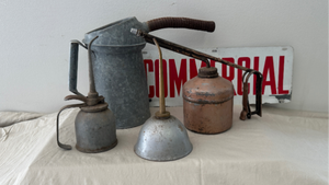 lot 30 image: Vintage oil cans and metal sprayer