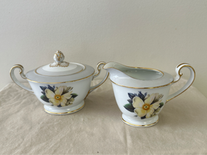 lot 57 image: Noritaki white rose China cream and sugar dish