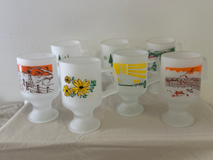lot 85 image: Set of 7 Vintage Indiana Glass Tiara Footed Frosted Glass Mugs