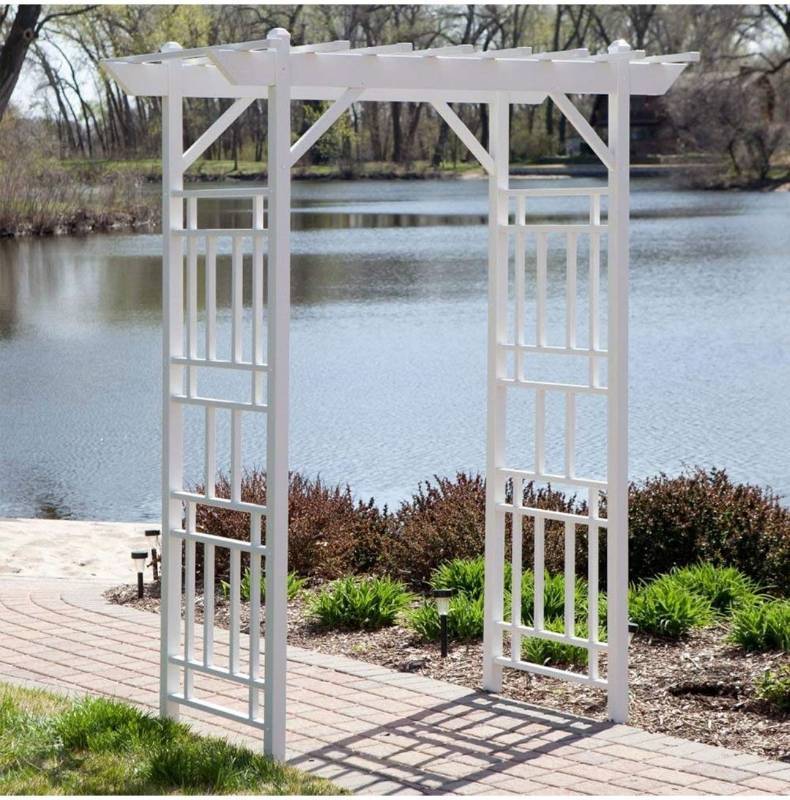 lot 59855 image: Decorative Backyard Arch with Lattice Design and Trellis Sides for Climbing Plants, Vines and Flowers. STOCK PHOTO MAY NOT BE EXACT. - Retail $153