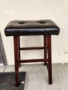 lot 259 image: Wood and Leather Backless Tufted Seat Bar Stool
